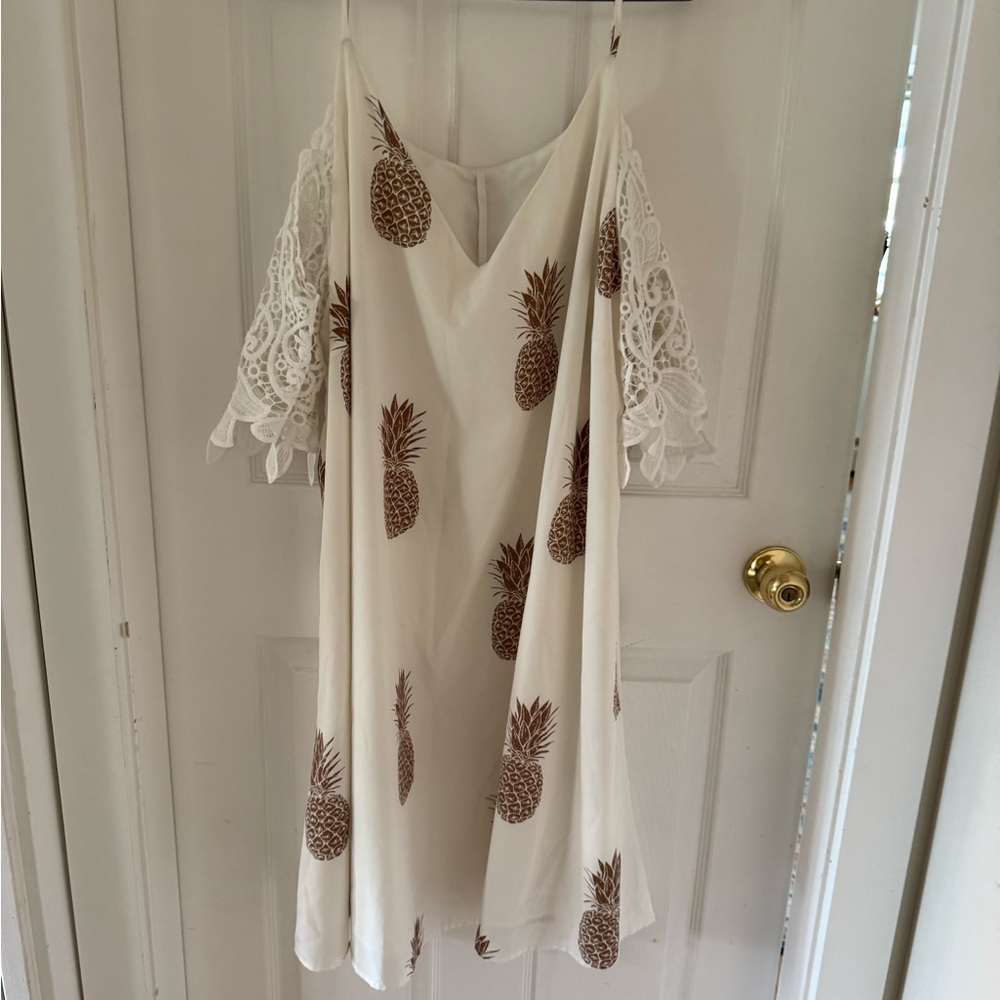 White dress with slip and lace sleeves. Super soft and flows beautifully.